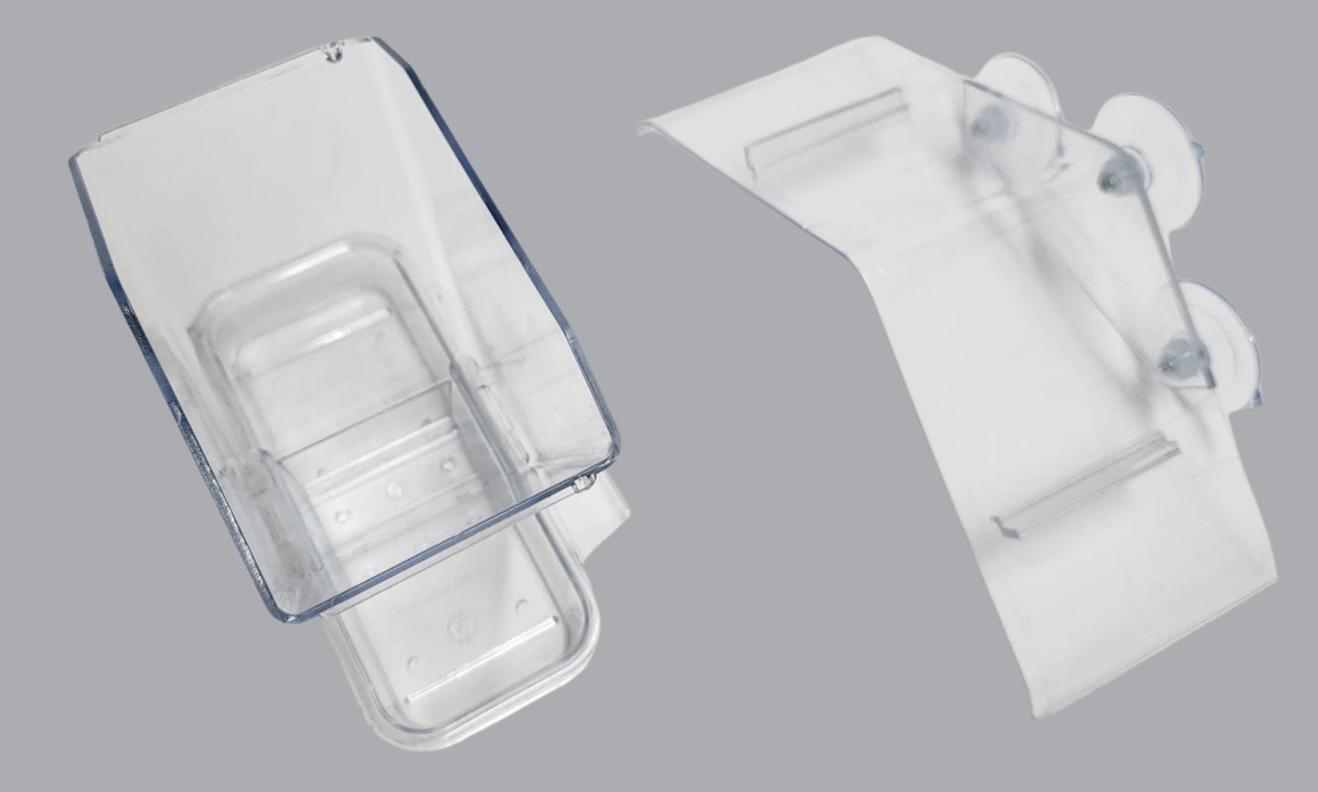 Clear diamond shaped feeder with roof off and three suction cups