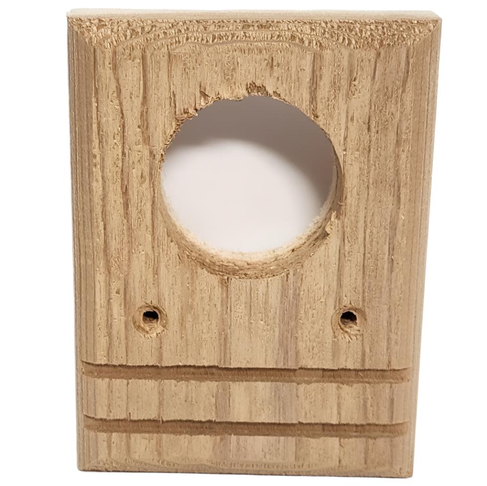 wood piece with two screw hole and a large entrance hole