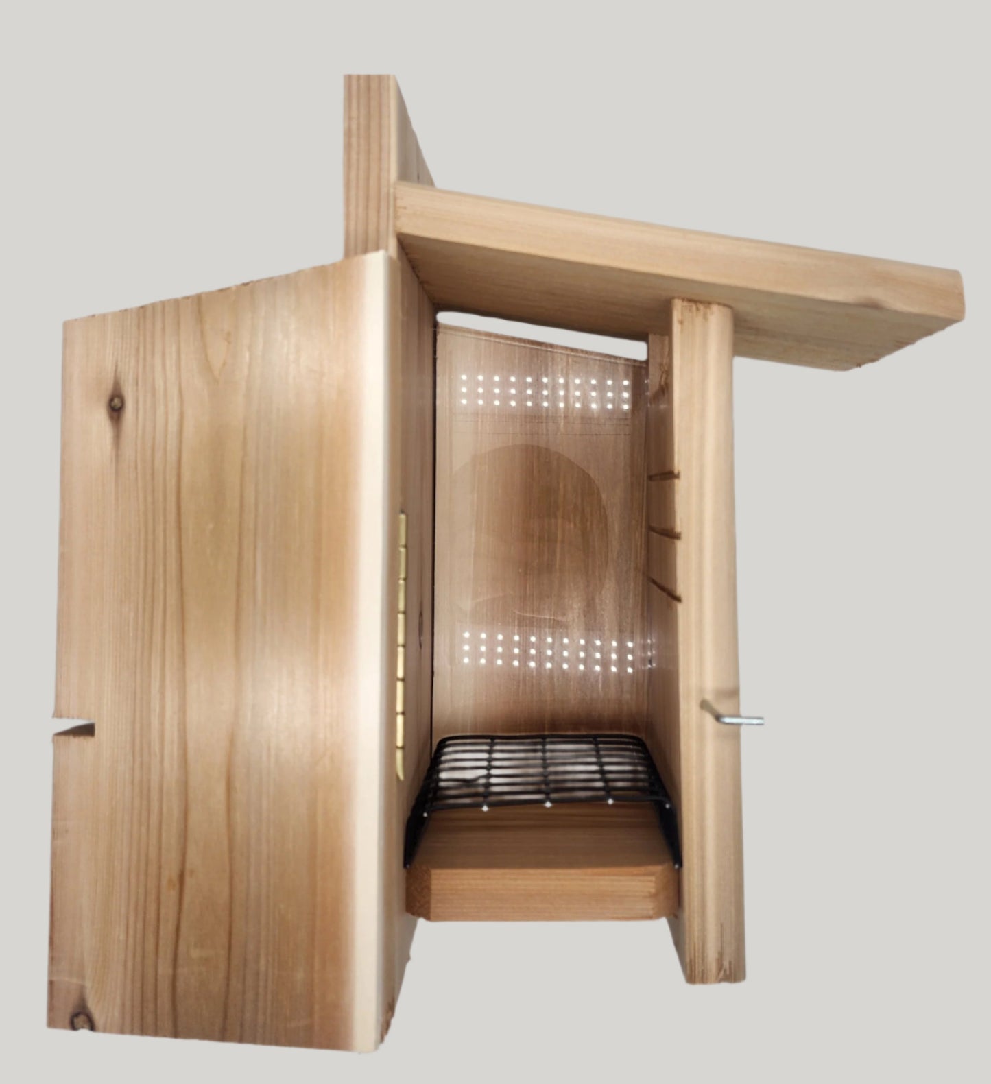 wood bird house with side door open