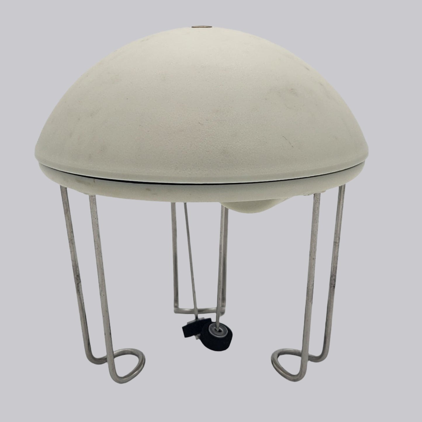 plastic, tan, half moon shaped bowl with wire legs