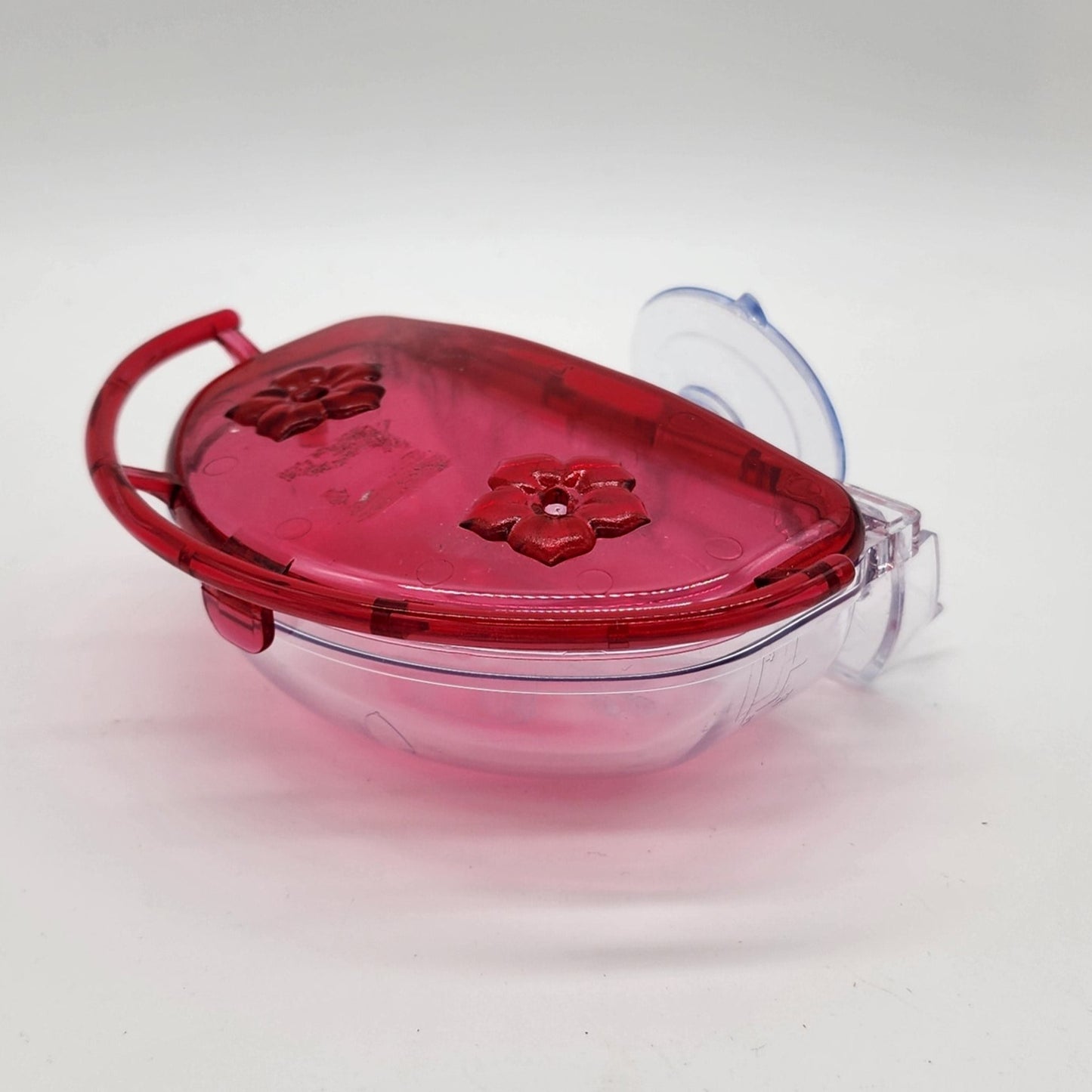 red window mount hummingbird feeder with raised perches