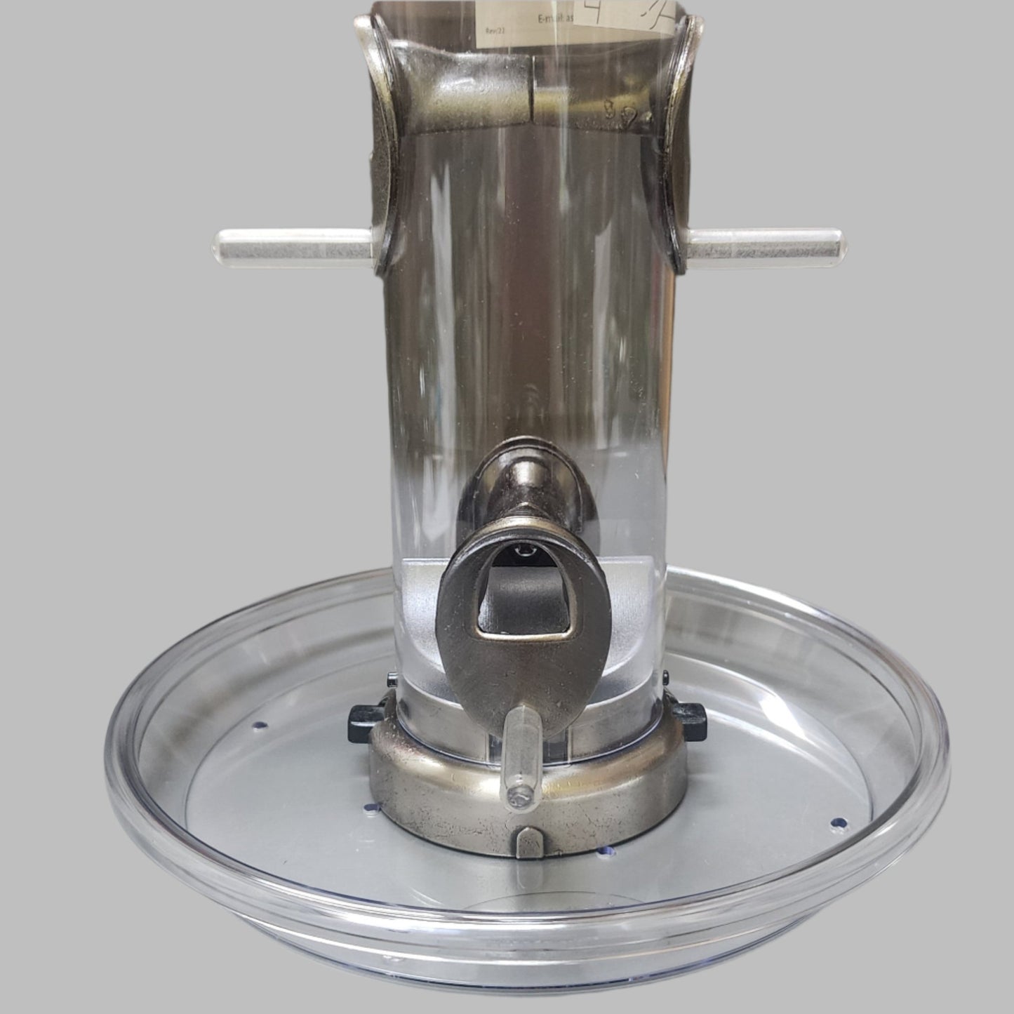 Clear tray on tube feeder with brush nickel ports