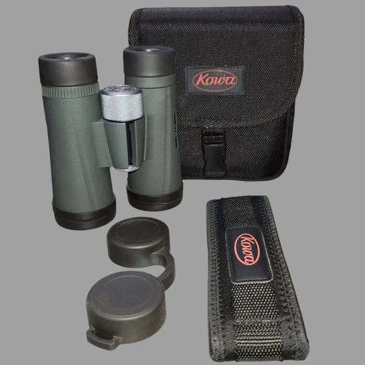 Green and black binoculars with black case, strap and eye cups