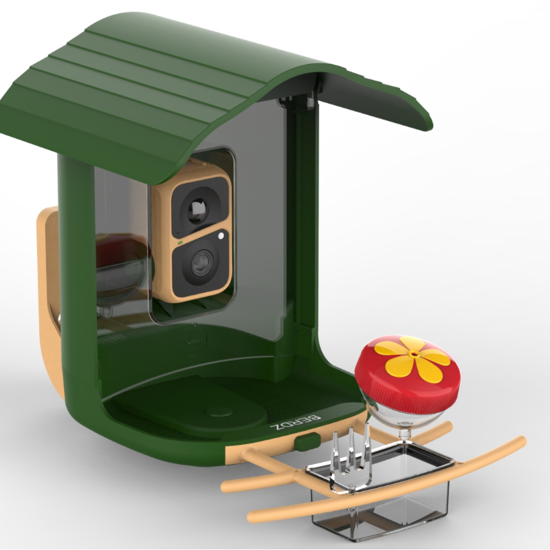 Green Bird feeder with camera, red dot, clear fork and cup
