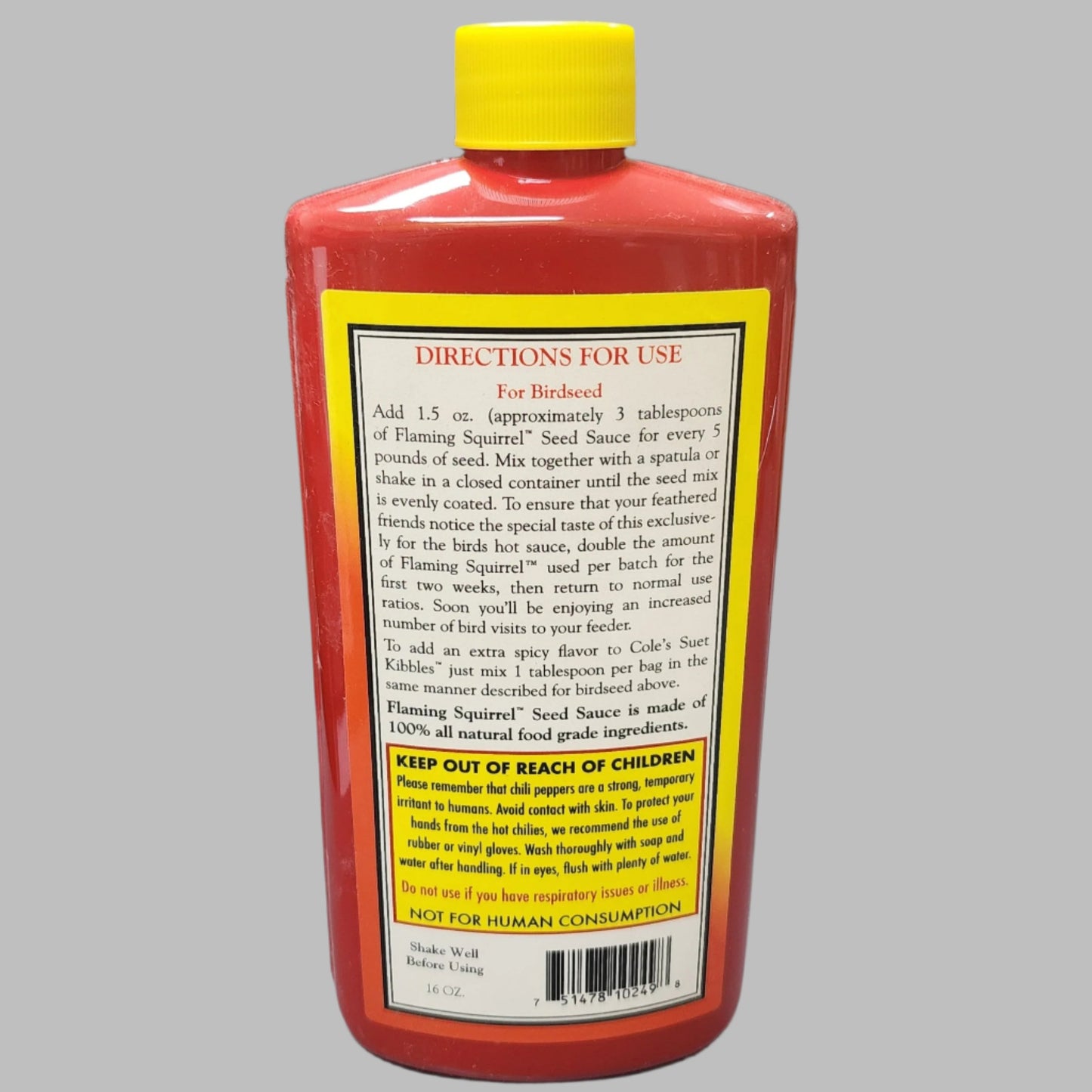 Red and yellow bottle with text on label