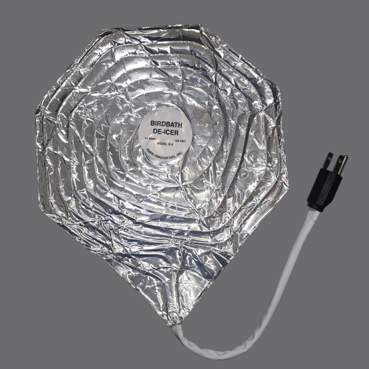 Silver octaganal heater with white cord