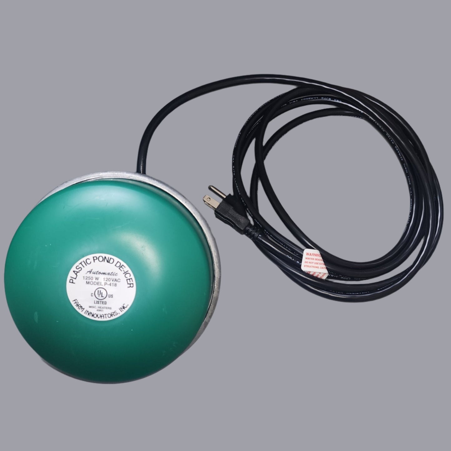 Green, round heater with black cord
