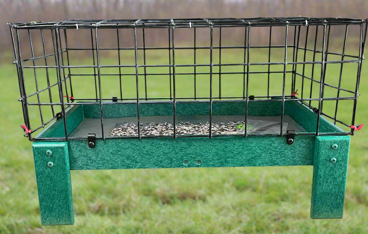 green recycle material tray with four legs and black cage, aka dove guard, attached