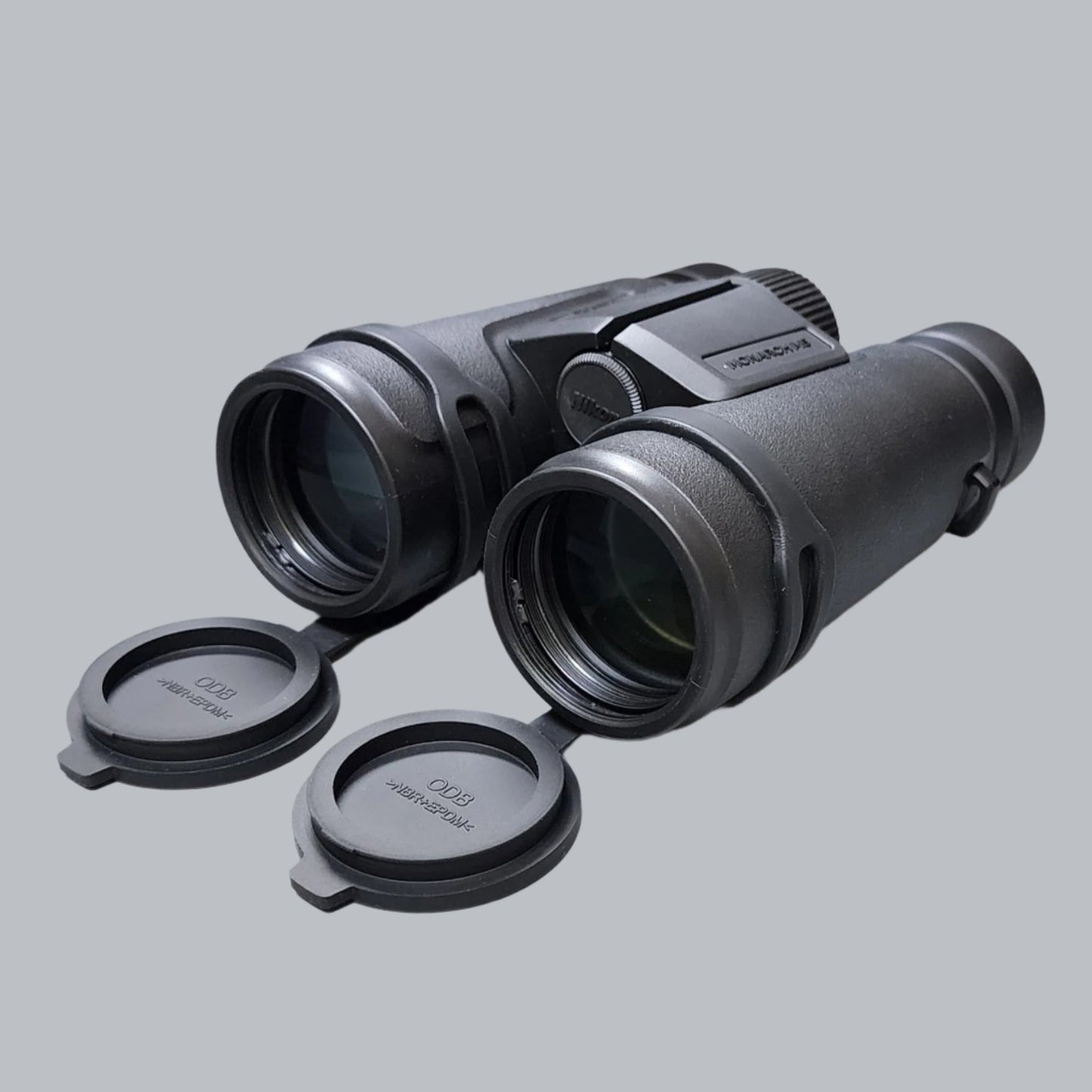 black binoculars with eye cups open