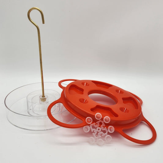Orange top oriole feeder open with bee guards on side