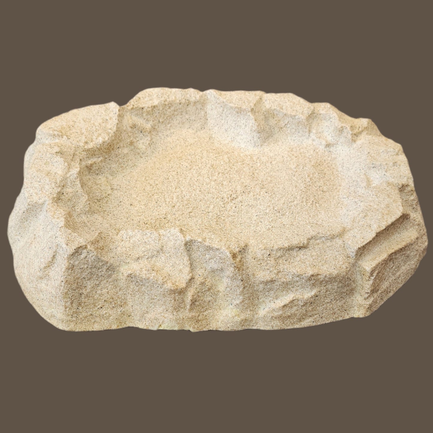 light tan rock shaped bird bath