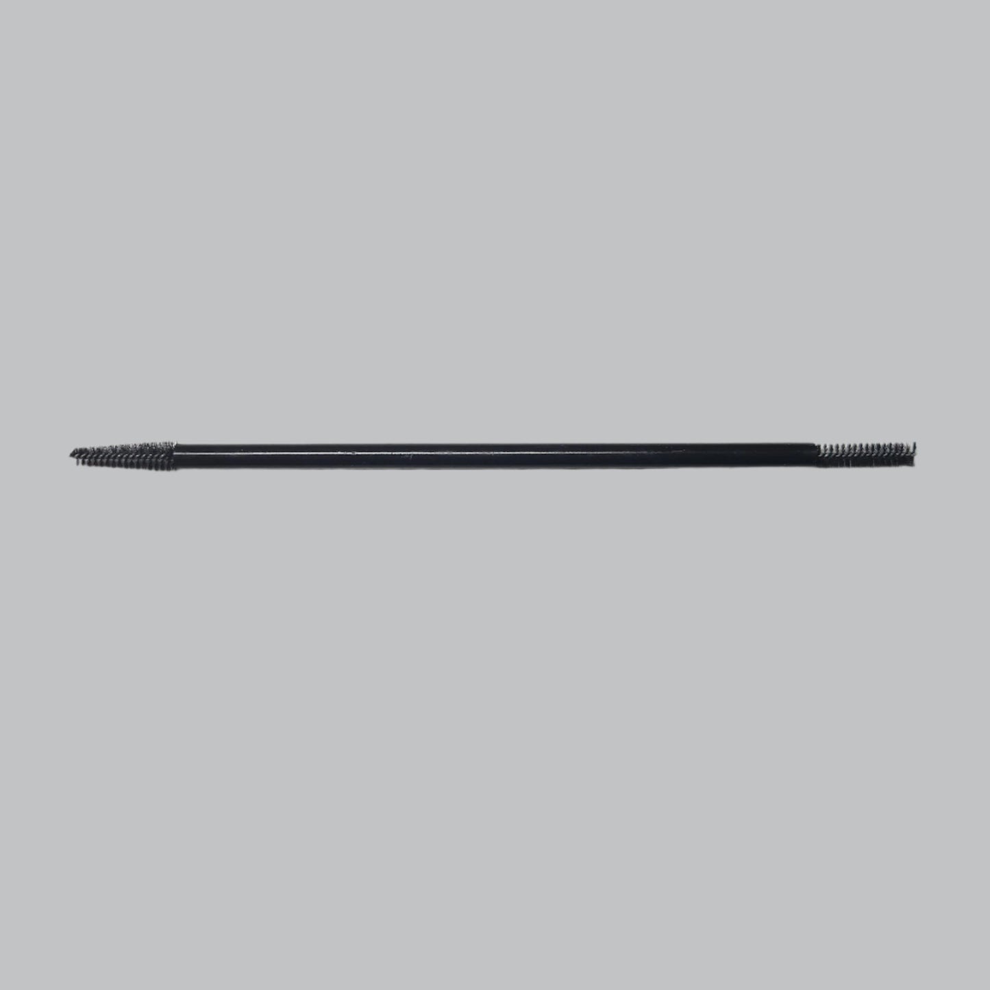 black thin brush with bristles on both ends