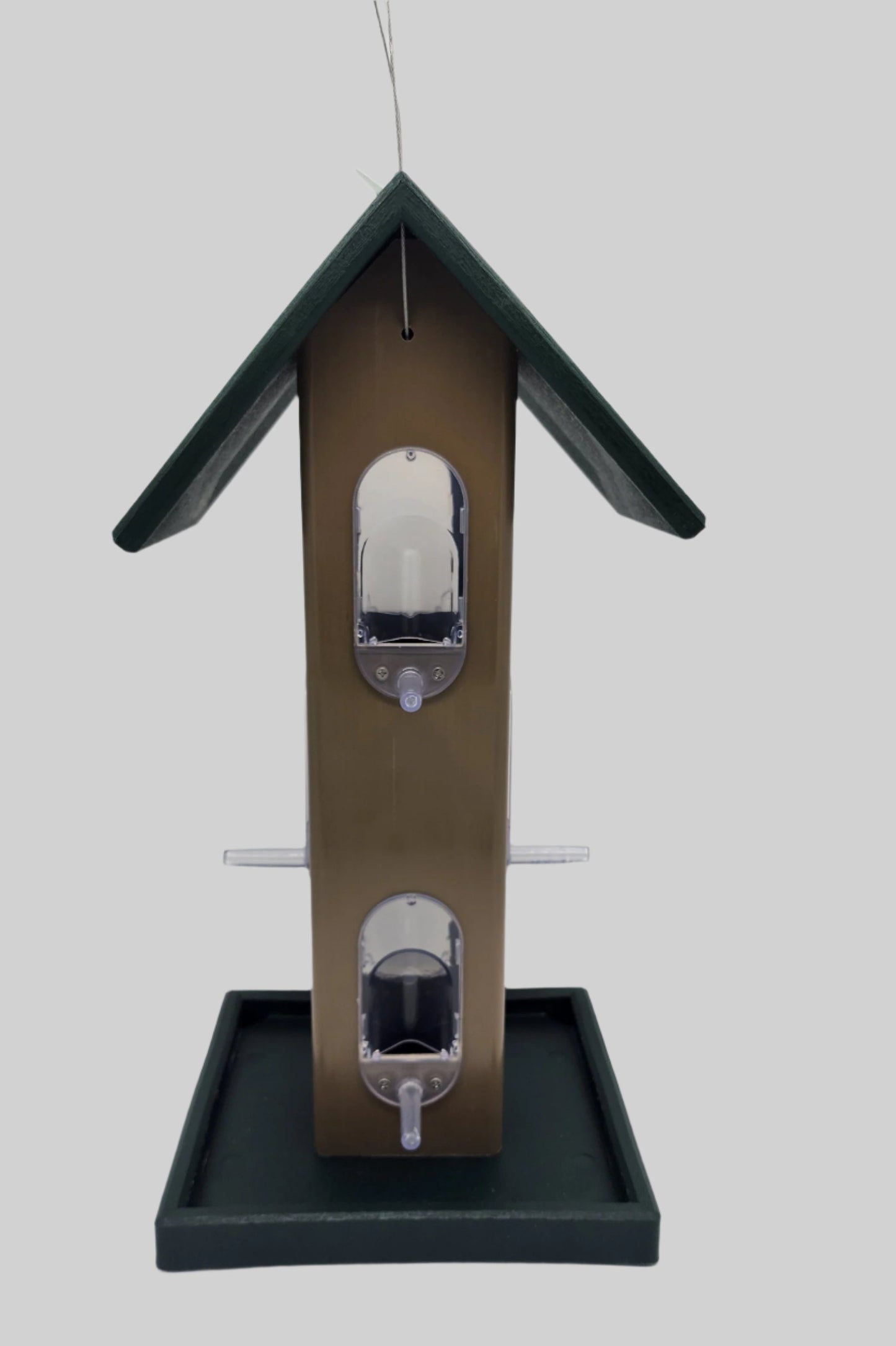 tan bird feeder with green roof and tray