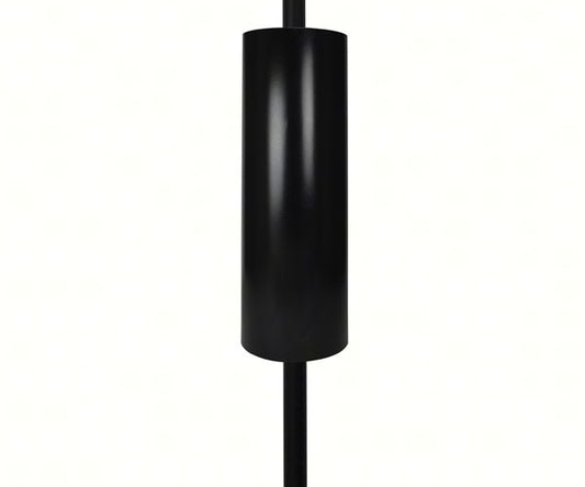 Black cylindrical object on a white background