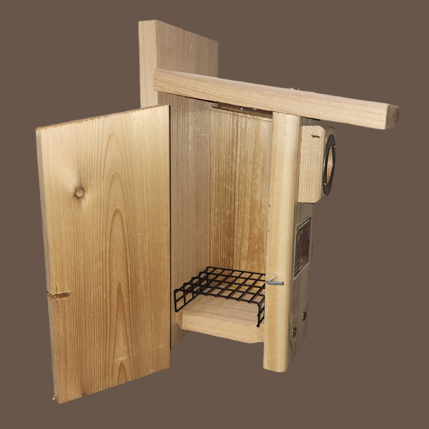 Wood bird house with side door open