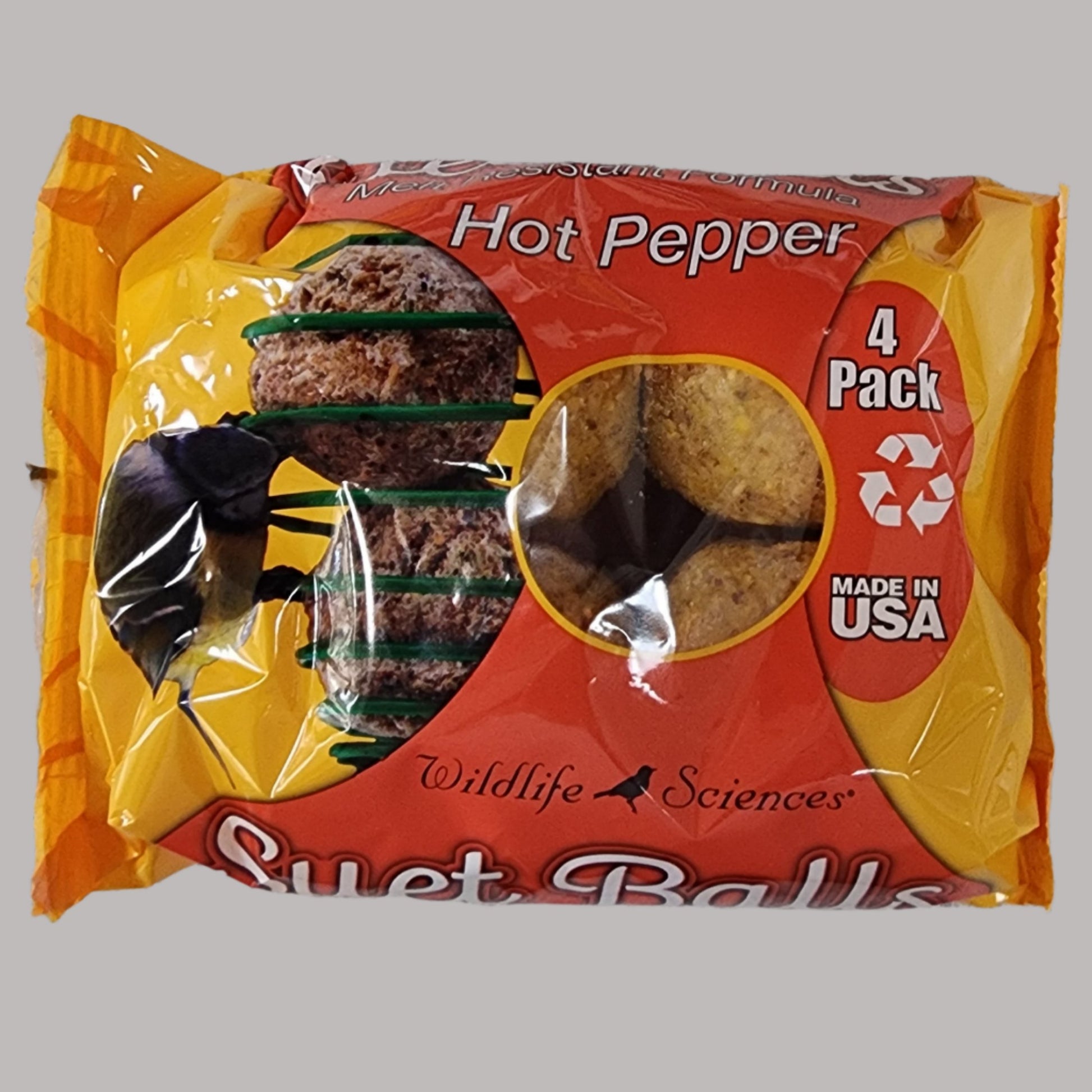 Orange and yellow bag of 4 suet balls with Hot Pepper on label