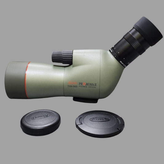 Green and black scope with black lense covers
