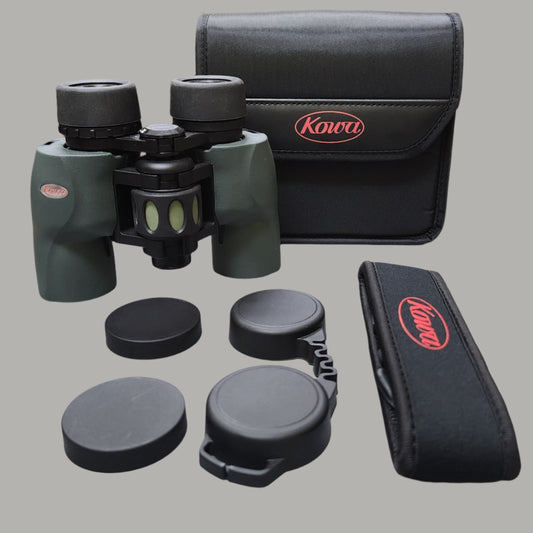 Green and black binoculars with black case, strap and eye cups