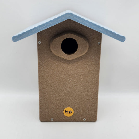 Tan bluebird house with light blue roof.