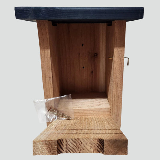 cedar bird house with blue roof and front open