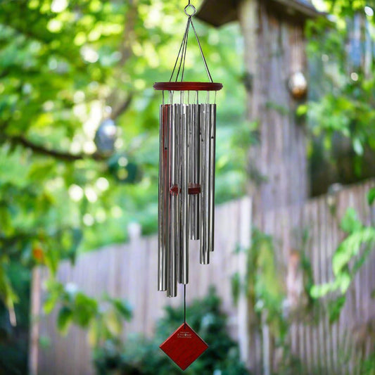 wind chime with silver tubes and wood top and paddle