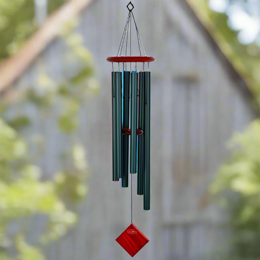wind chime with green tubes and wooden top paddle