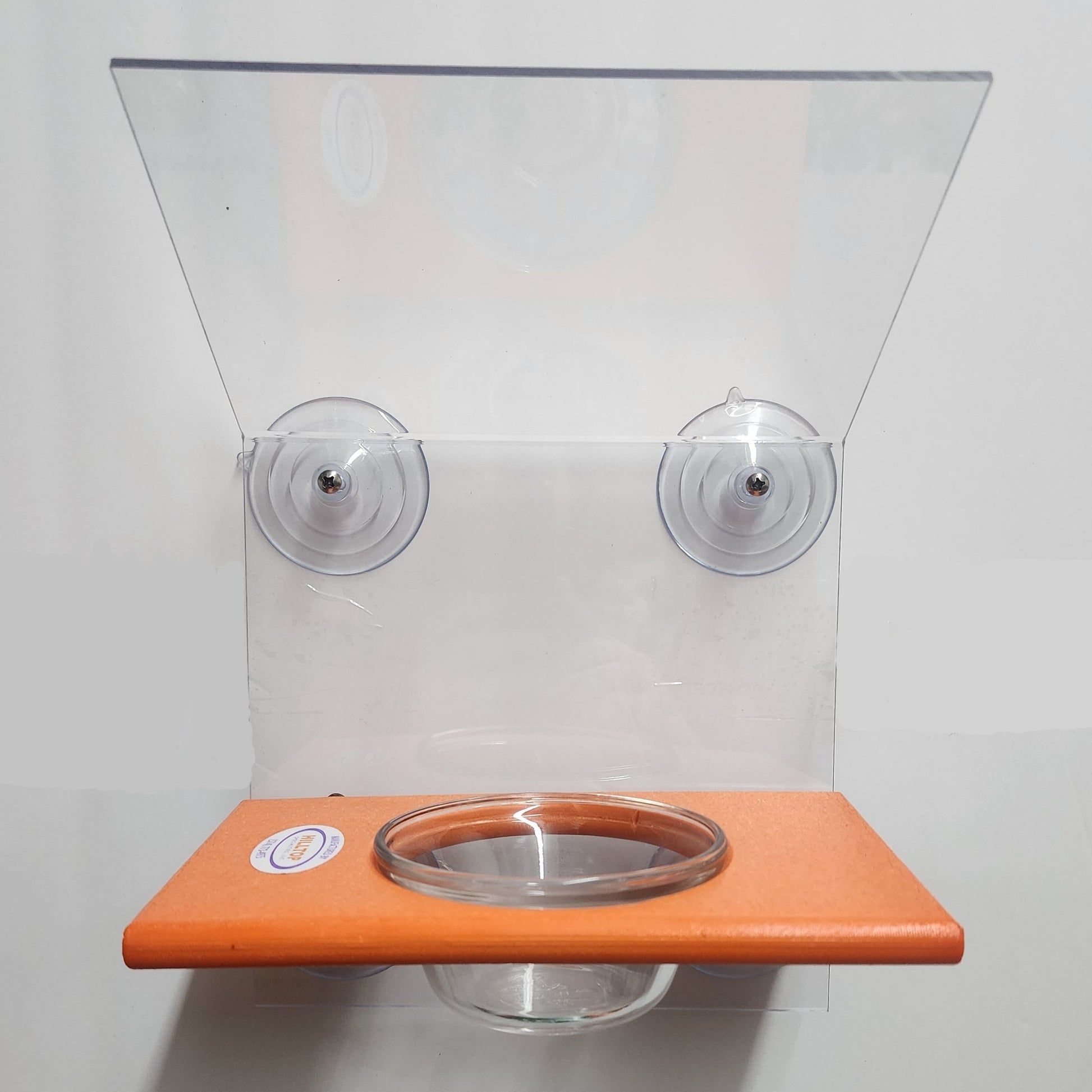 clear top, back and bowl with orange base