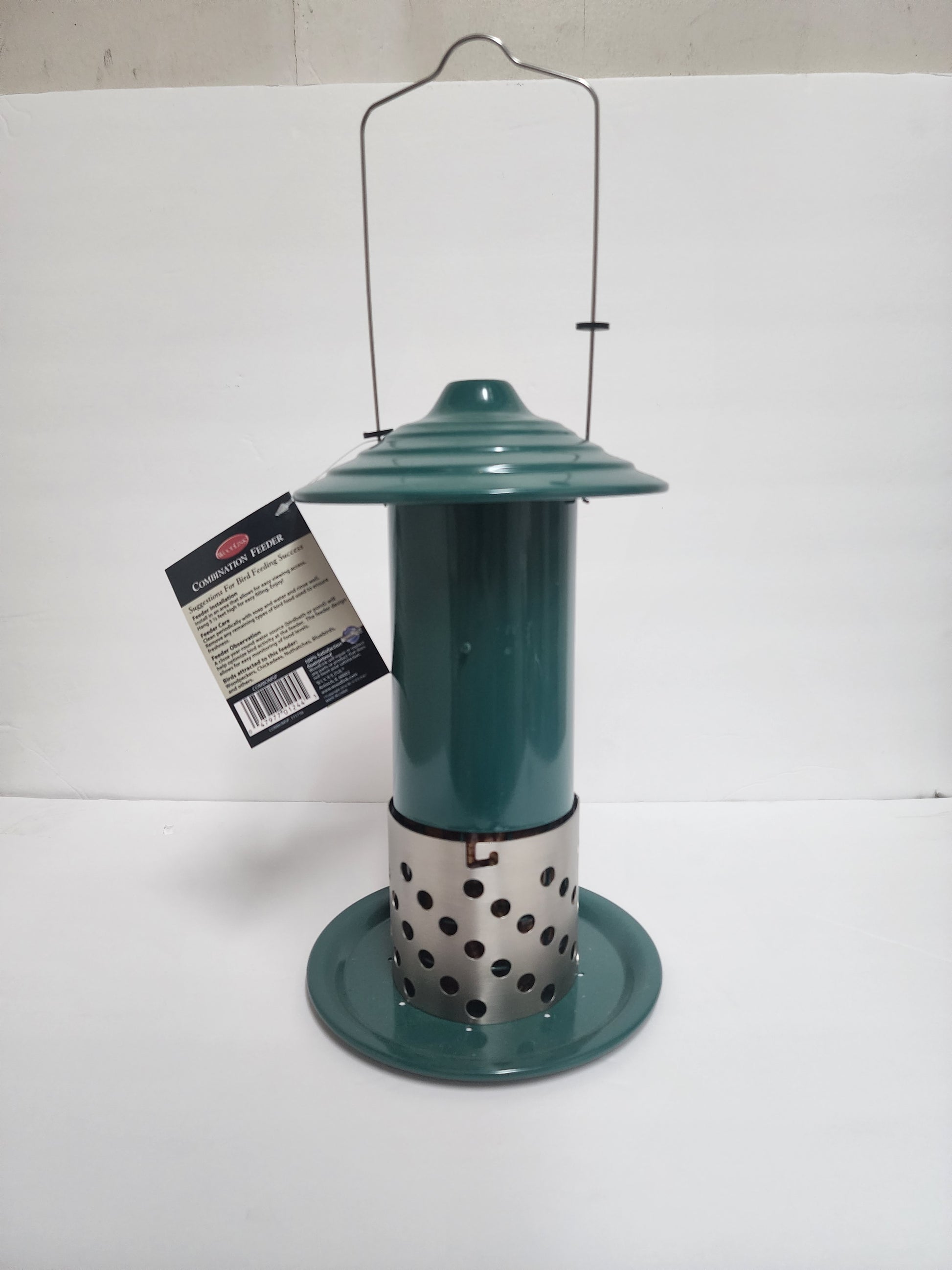 Green feeder with silver section with holes