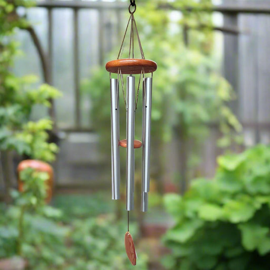 wind chime with silver pipes and wood top and paddle