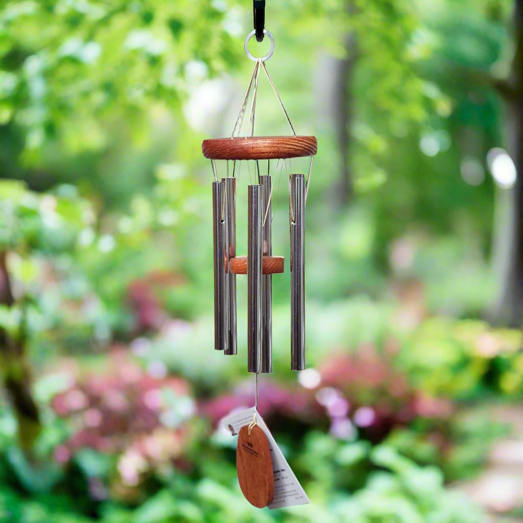 wind chime with silver pipes and wood top and paddle