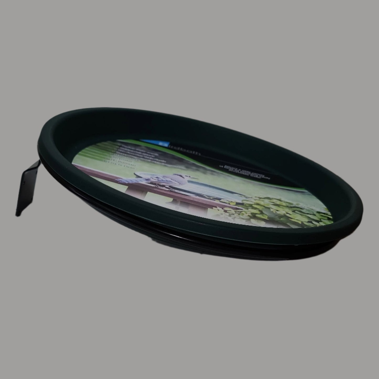 Green bird bath bowl with black bracket