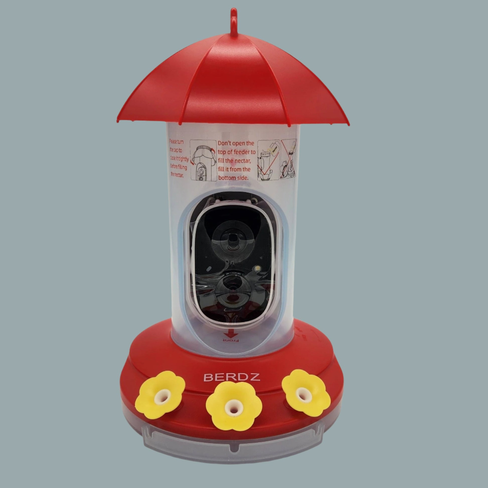 clear feeder with camera and red top and base with yellow flowers