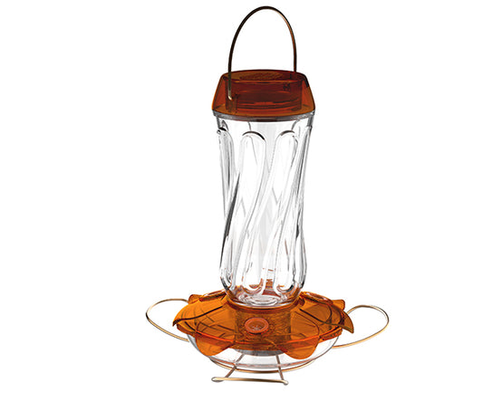 Glass bird feeder with orange top and base