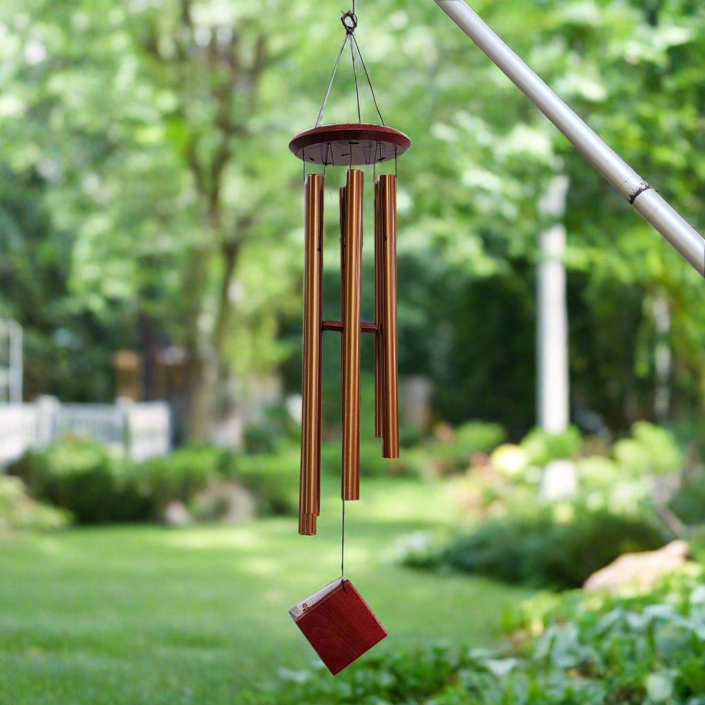 wind chime with wooden top and paddle with bronze tubes