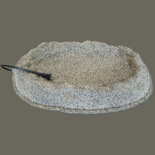 Sand coated natural rock looking bird bath with black cord