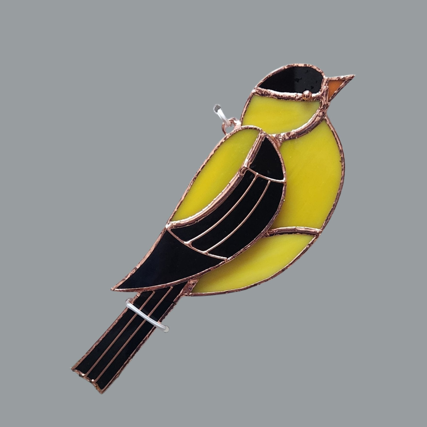 yellow and black goldfinch