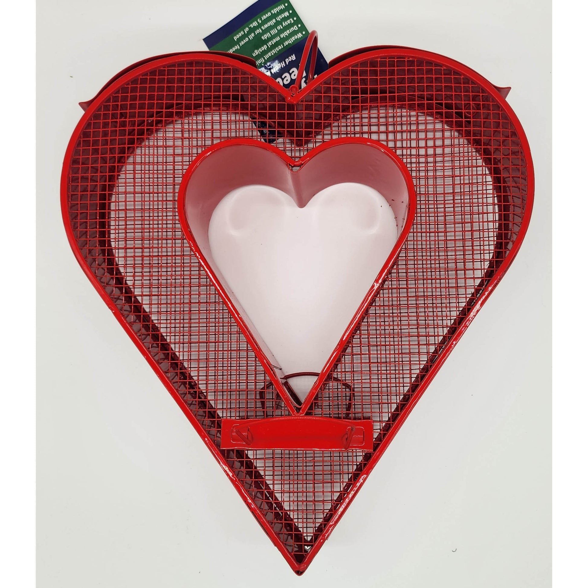 Red heart-shaped wire mesh bird feeder