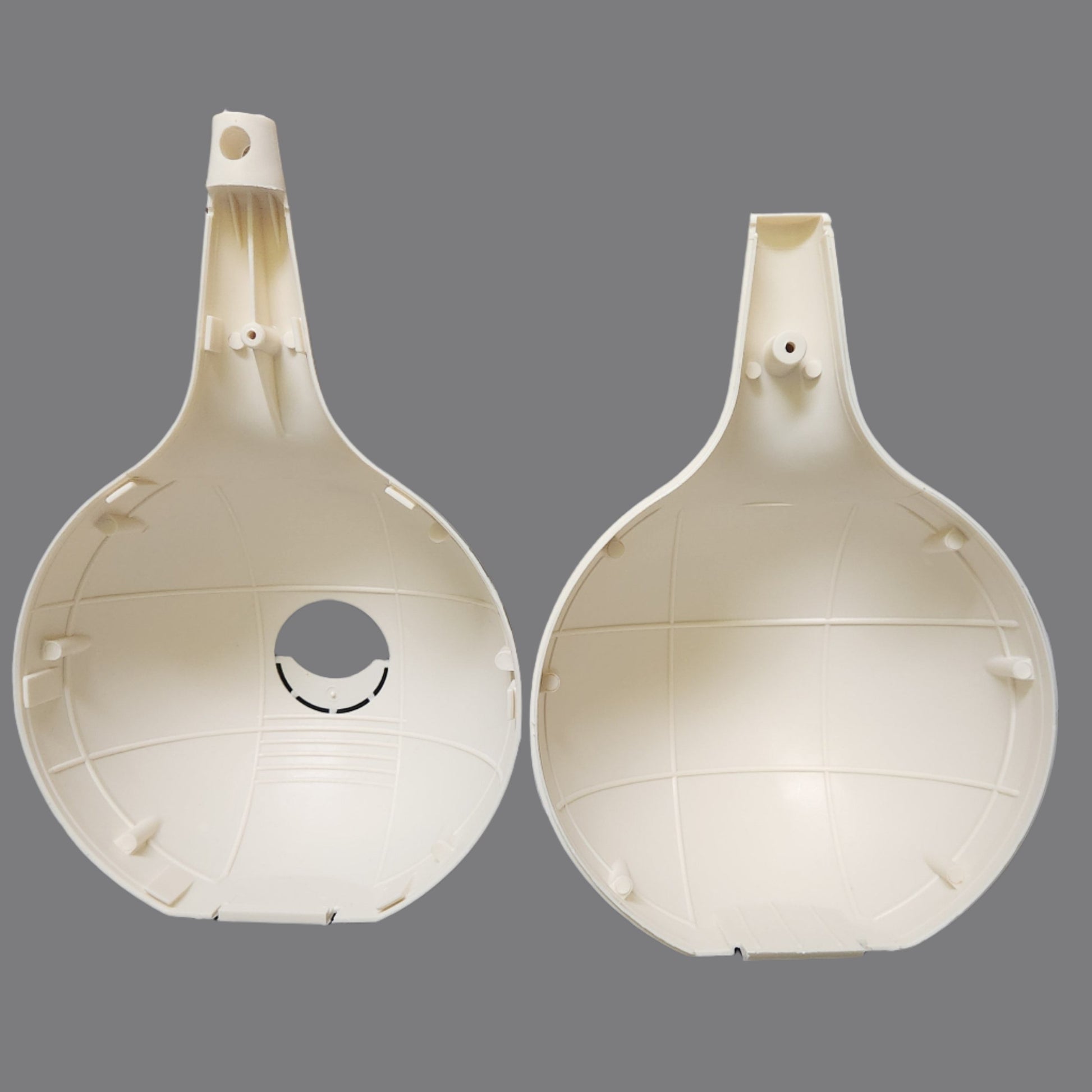 two halves of white plastic gourd