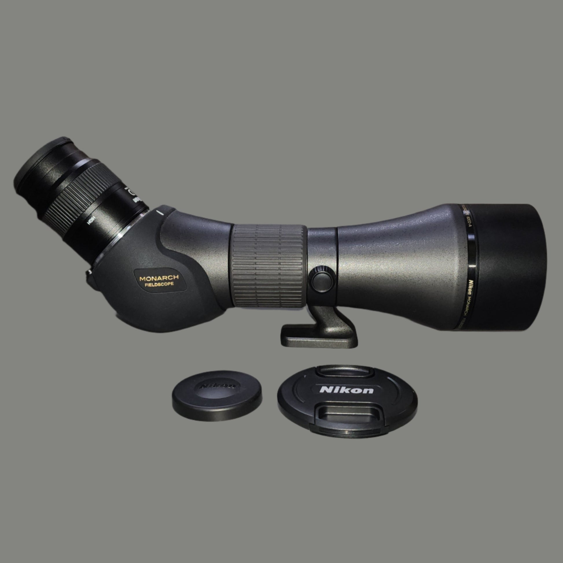 Black spotting scope with lens covers