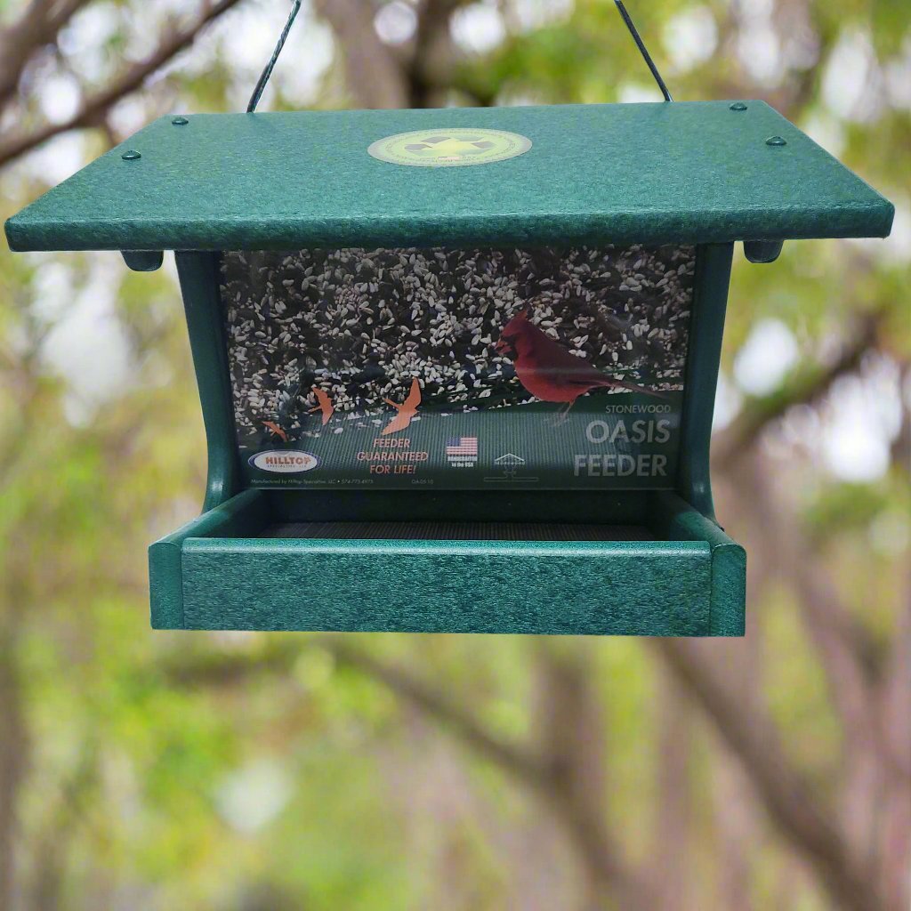 Green bird feeder with label