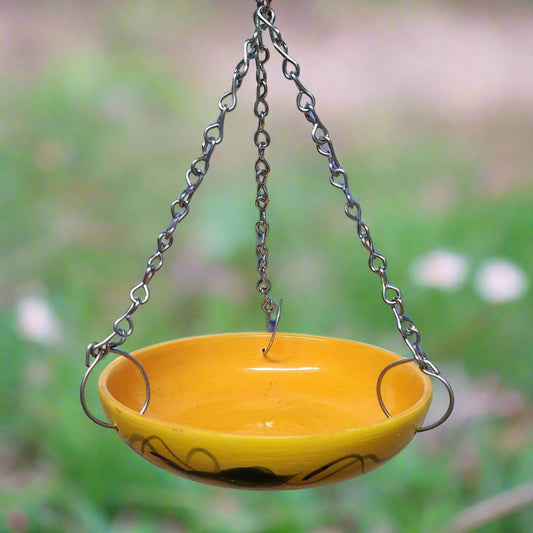 orange bowl with silver chain hangers