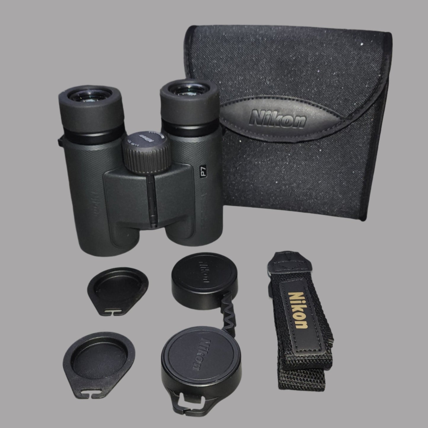 Black binoculars, case, strap and eye cups