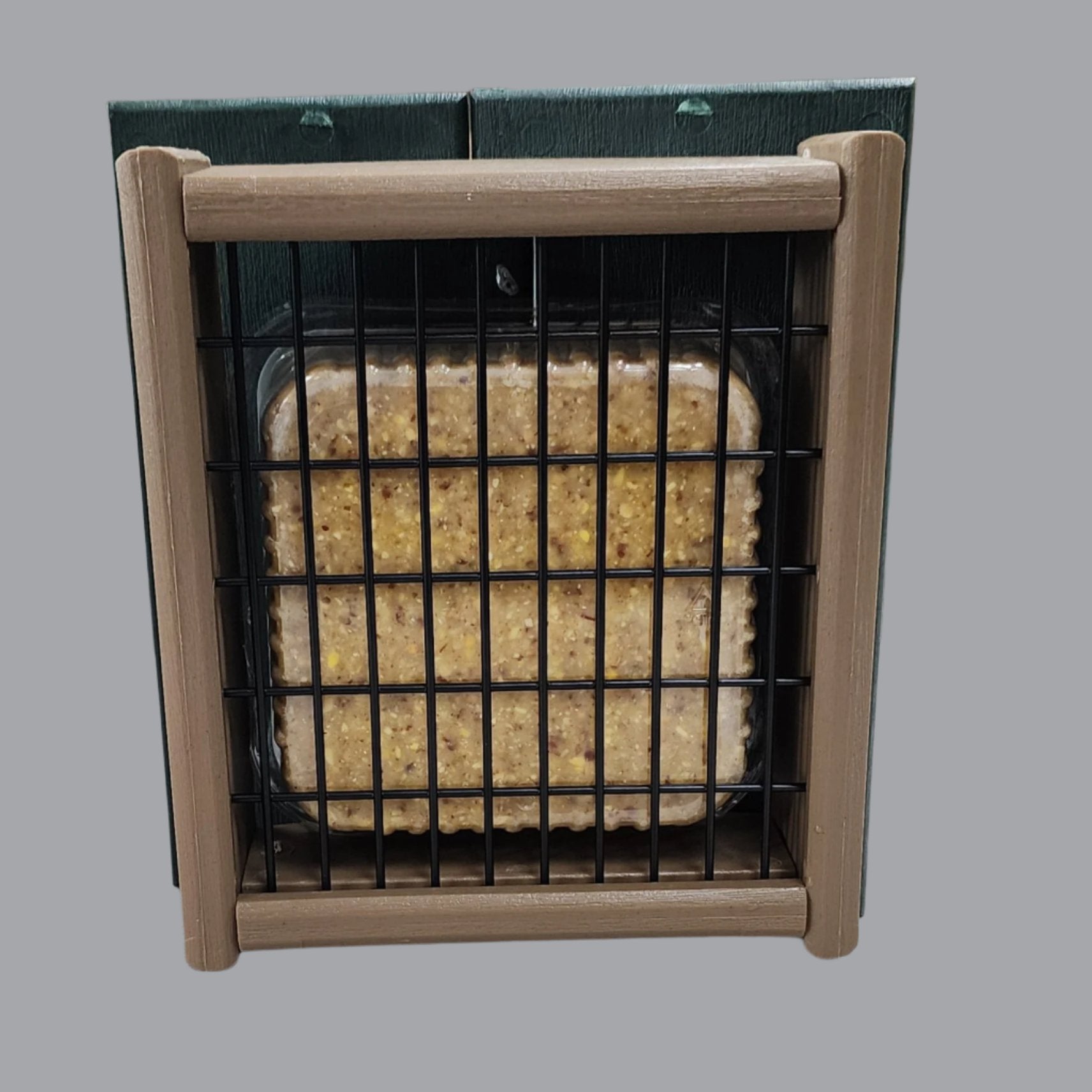 Green and tan square feeder with black wire and suet cake