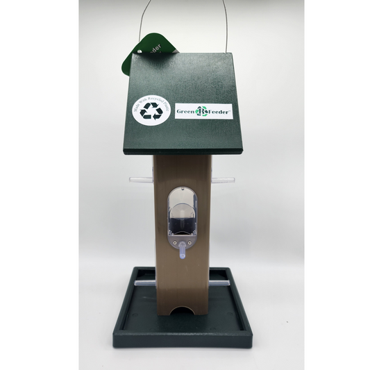 tan bird feeder with green roof and tray