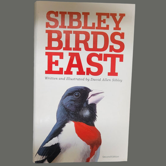 Sibley Birds East Book cover with red, white and black bird