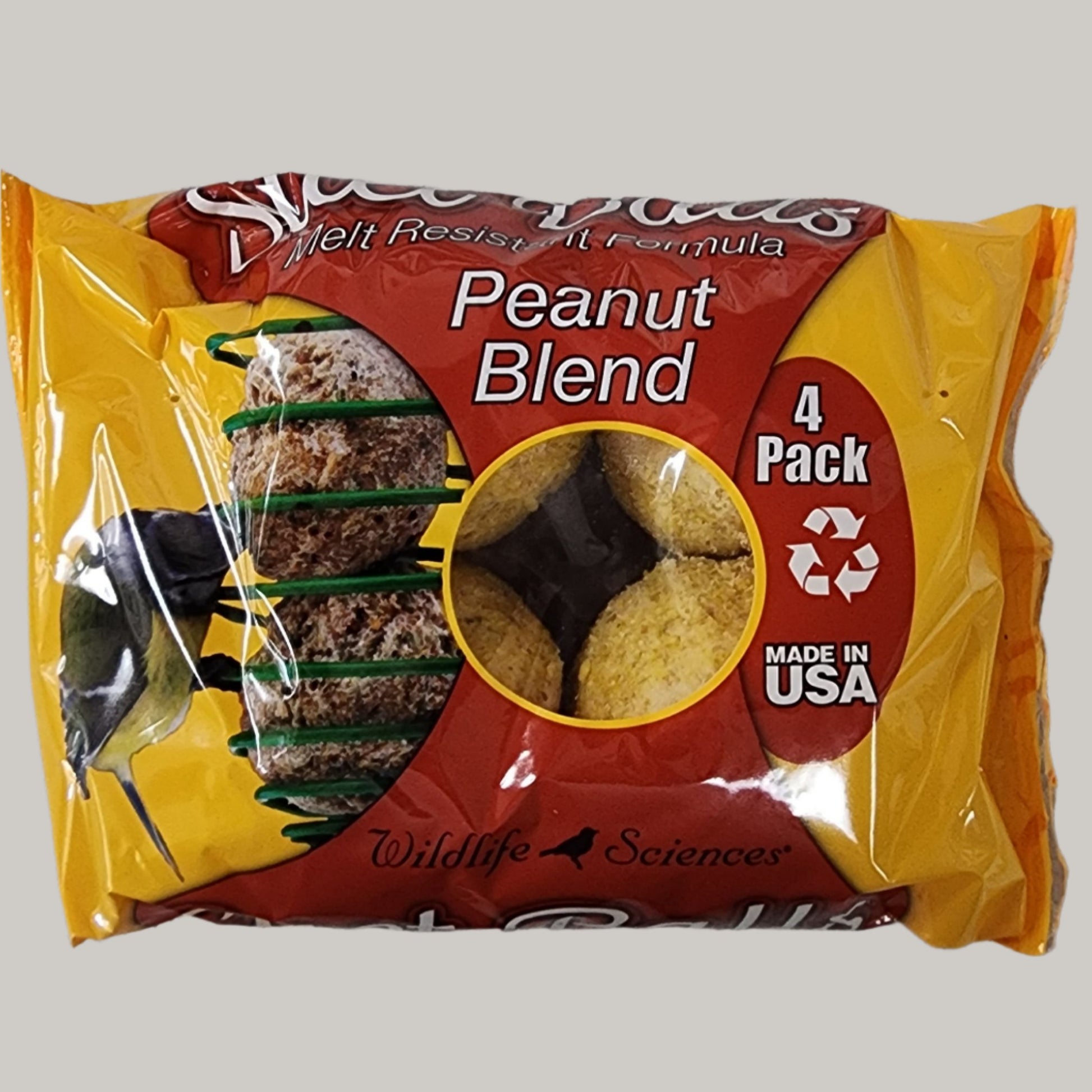 Brown and yellow bag of 4 suet balls with Peanut Blend on label