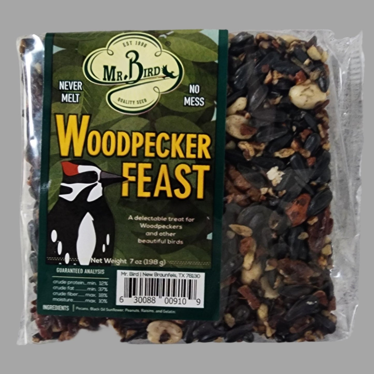 Square block of bird seed with Woodpecker Feast label