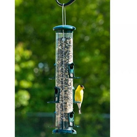 Green tube bird feeder with goldfinch