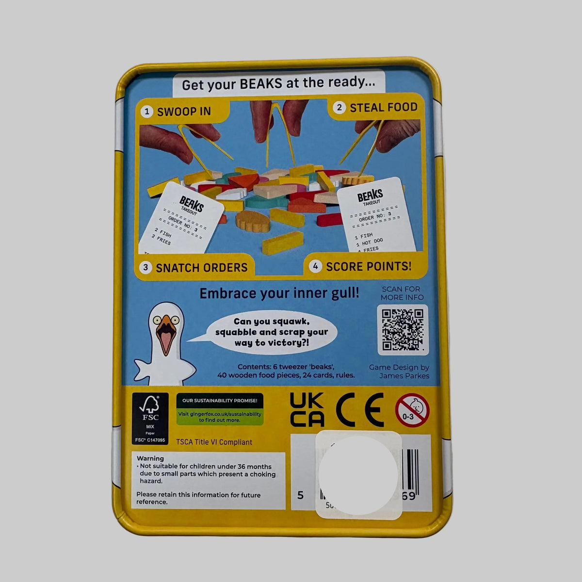 The back of a yellow metal tin package for a game called 'Get your BEAKS at the ready.