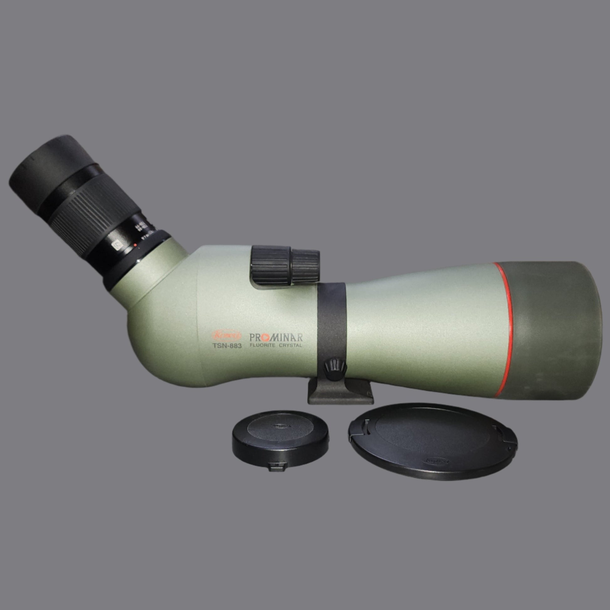 Green and black Spotting scope with black lens covers